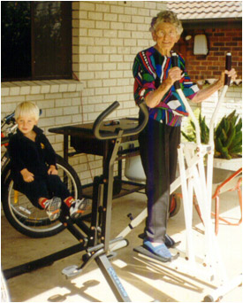 Elderly Grandmother and Boy Exercising